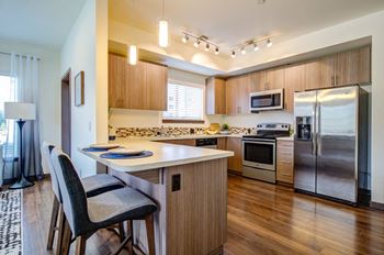 Fully equipped kitchen at Discovery West Apartments in  Issaquah, WA